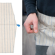 Illustration for article titled A Hidden Strap Turns This Tea Towel Into a Kitchen Apron
